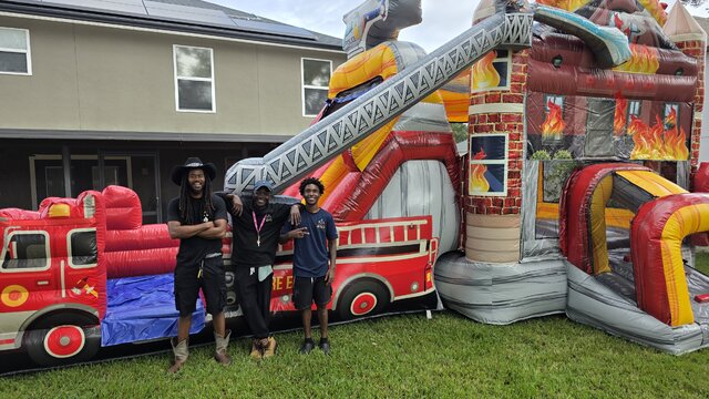 Firetruck Dual Lane Water Bounce House inflatable in Orlando FL backyard rental