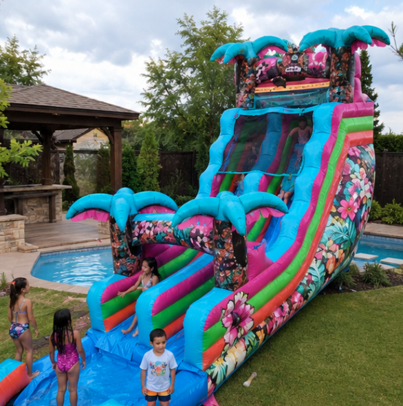 Multicolor inflatable water slide with pink, teal, orange, and green details set up for a children’s backyard party.