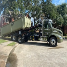 roll away dumpster truck from arcann companies