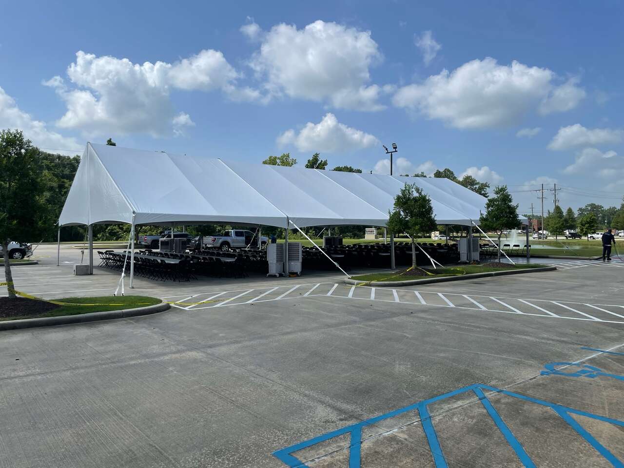 Tent set up at a plant receiving dock for a safety meeting