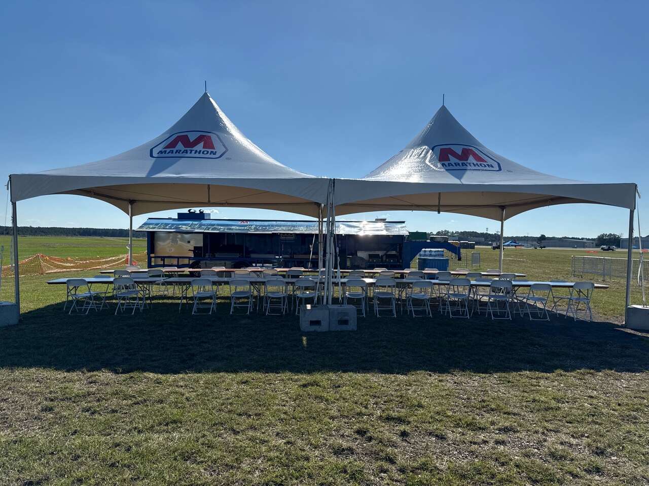 BASF branded tent set up by Ascension Party Rentals