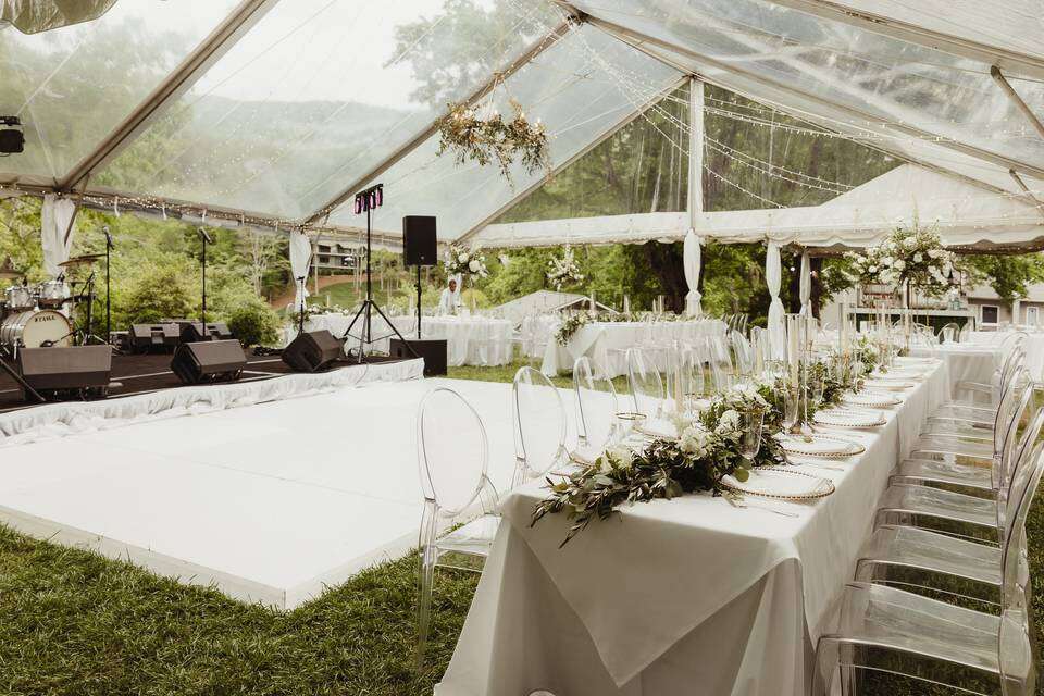 Elegant wedding tent package with lighting and reception setup in Augusta, ME Elegant wedding tent package with lighting and reception setup in Augusta, ME