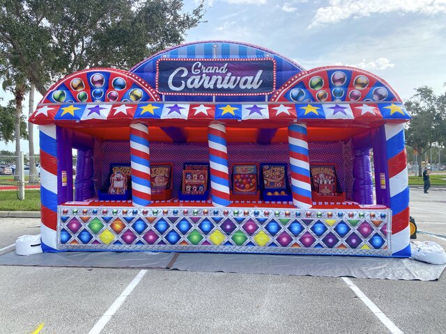 Grand Carnival Experience rental for parties in Austin Texas from Austin Bounce House Rentals