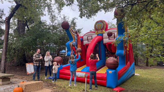Shooting Stars basketball shootout game setup outdoors with kids playing and having fun.