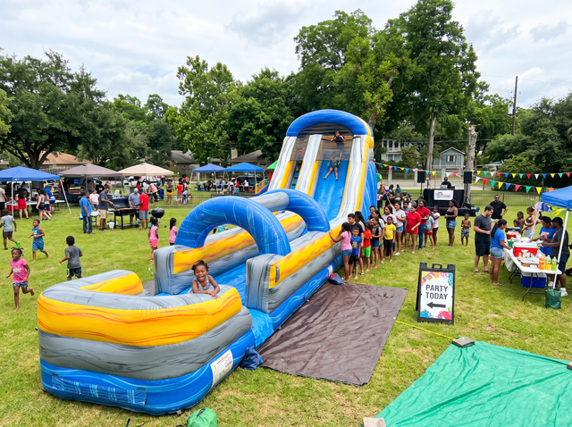 20ft Blue Crush water slide with slip and slide rental in Greater Austin TX - Jump Around Party Rentals