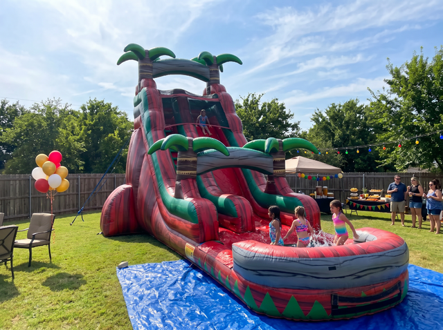 22ft Ruby Crush water slide rental at a Georgetown TX backyard party - Jump Around Party Rentals