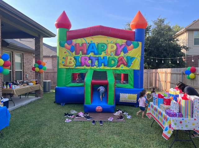 Happy birthday bounce house rental at a Liberty Hill TX party - Jump Around Party Rentals