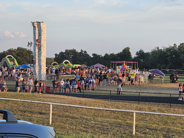 Rock climbing wall rental at a school carnival event in Greater Austin - Jump Around Party Rentals