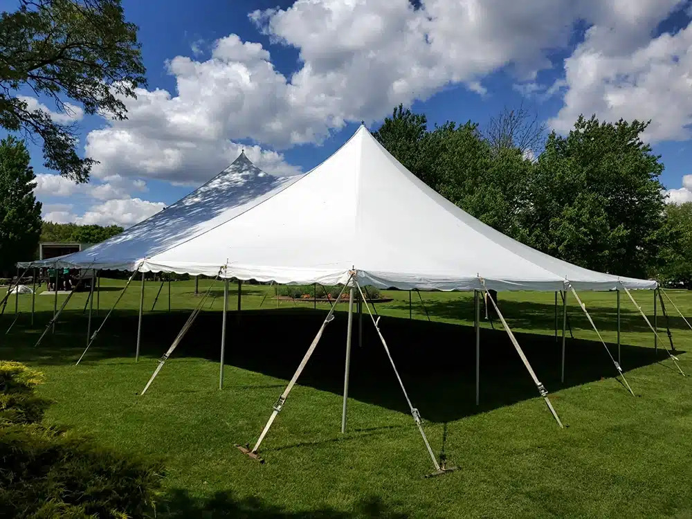 Event tent rental set up at an outdoor party in Greater Austin