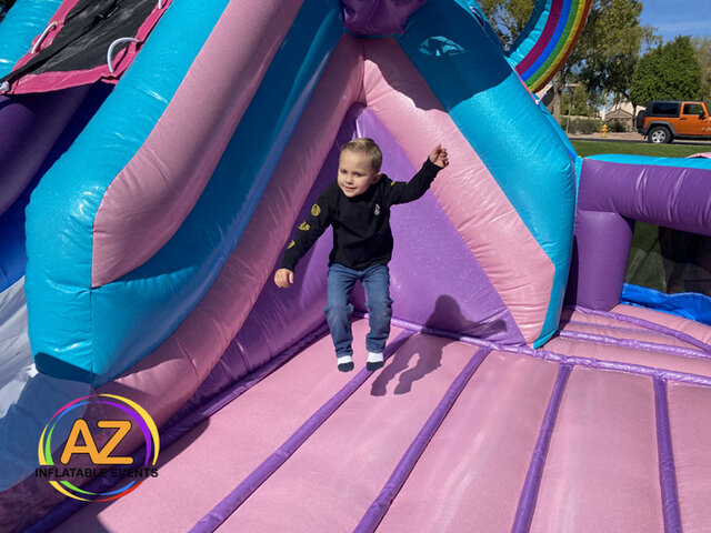 Jumping in a Bounce House Rental by AZ Inflatable Events