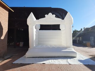 white wedding bounce house