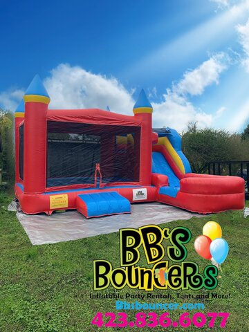 Red and blue bounce house with single lane slide