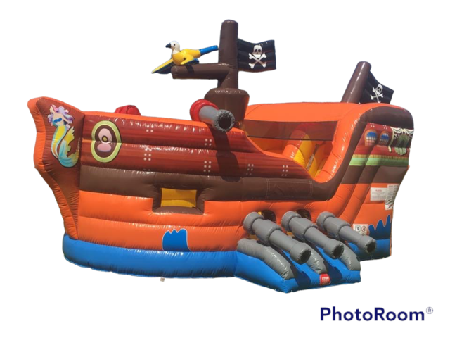 Pirate ship shaped bounce house with slide 