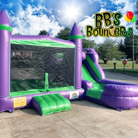 Green and purple bounce house with single lane slide
