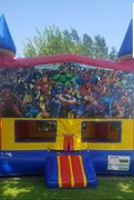 Large Bounce House with justice league banner 1