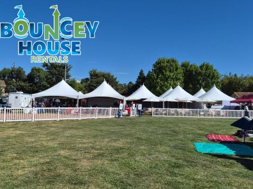 Corporate event tent rentals in Sacramento from Bouncey House Rentals with high-peak tents, tables, and chairs for company picnics