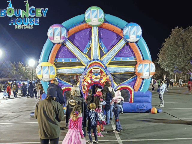 Ferris wheel bounce house with a slide attached rented in Rancho Cordova