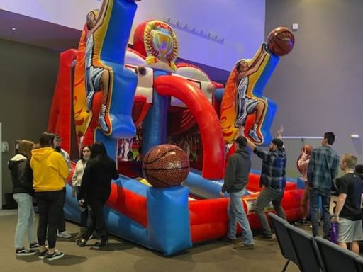 Football inflatable game rental for school field days and campus events in Sacramento from Bouncey House Rentals