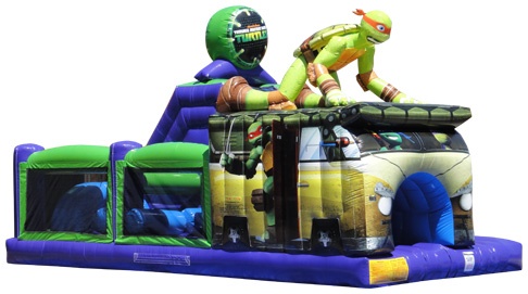 Teenage Mutant Ninja Turtles themed inflatable obstacle course rental in Sacramento, CA from Bouncey House Rentals set up on grass at an outdoor party