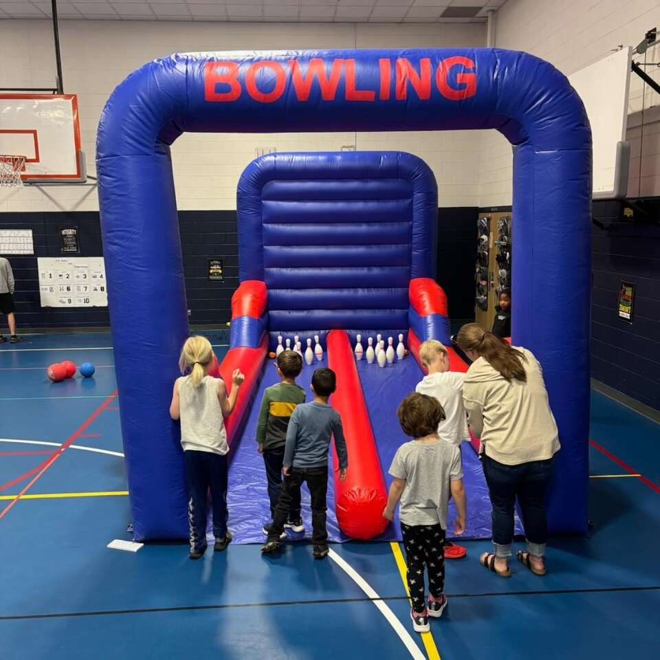 Big Sky Bounce inflatable bowling game rental setup