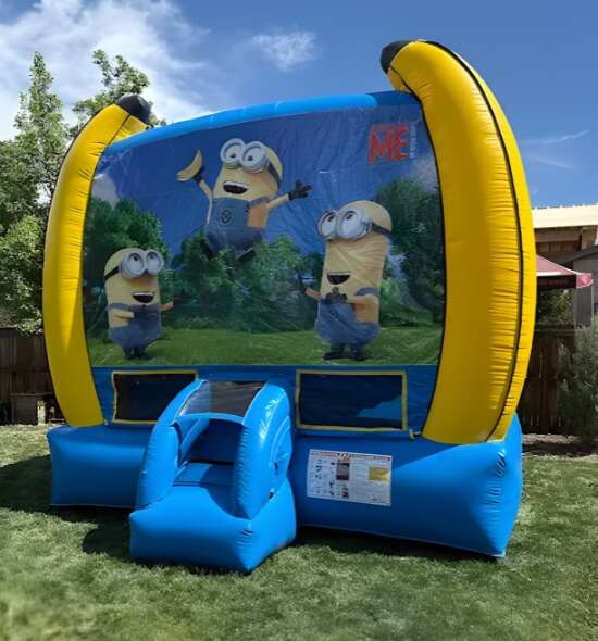 Minions-themed inflatable bounce house by Big Sky Bounce