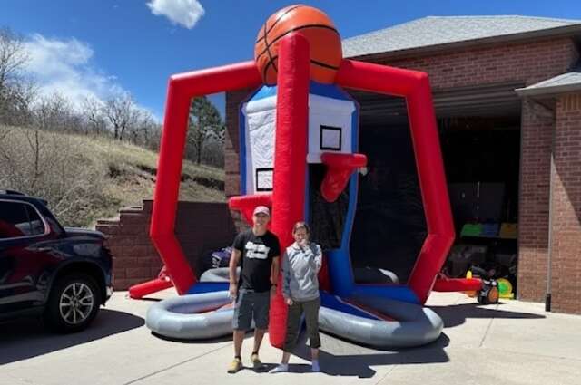 Adult inflatable basketball dunk game rental by Big Sky Bounce