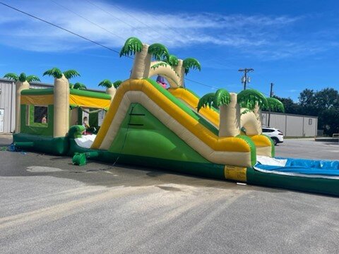Tropical splash waterslide and bounce house 