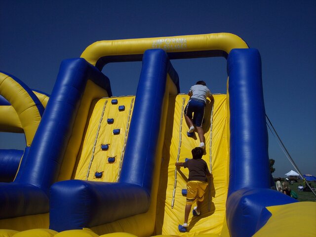 Climbing Rock Climb Wall on 60 Ft Obstacle from Biloxi Bounce House