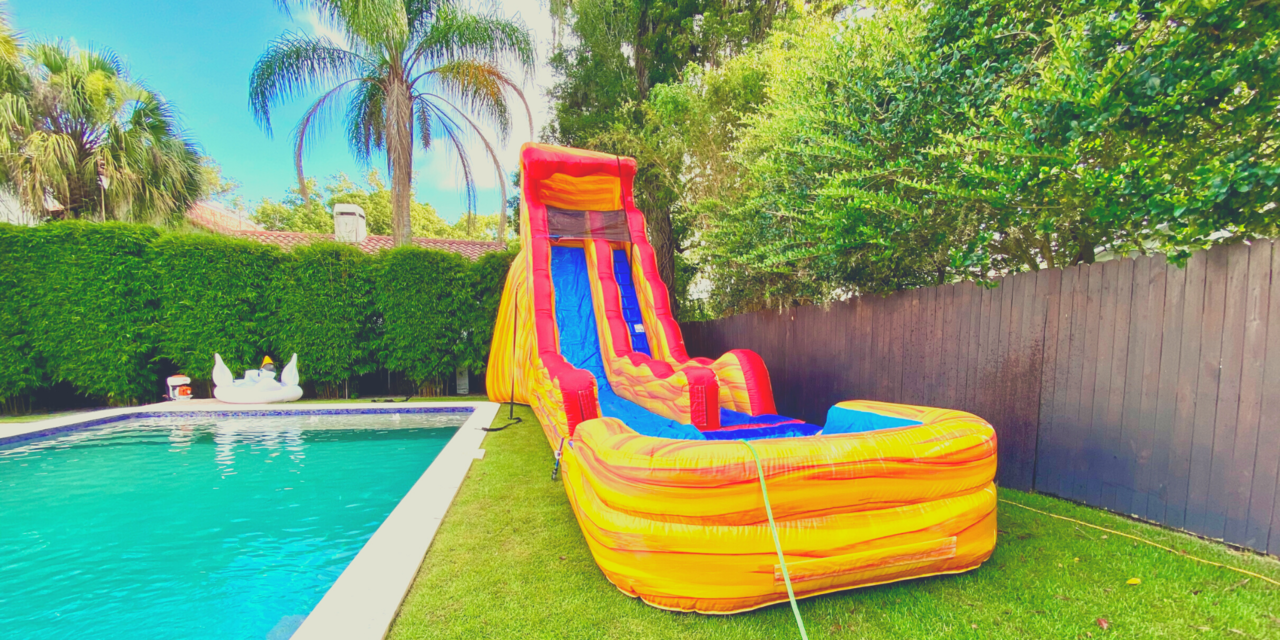 20 waterslide by a pool