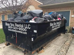 Junk in a Blue Box Rentals dumpster from the Hagerstown, MD-based dumpster rental company.