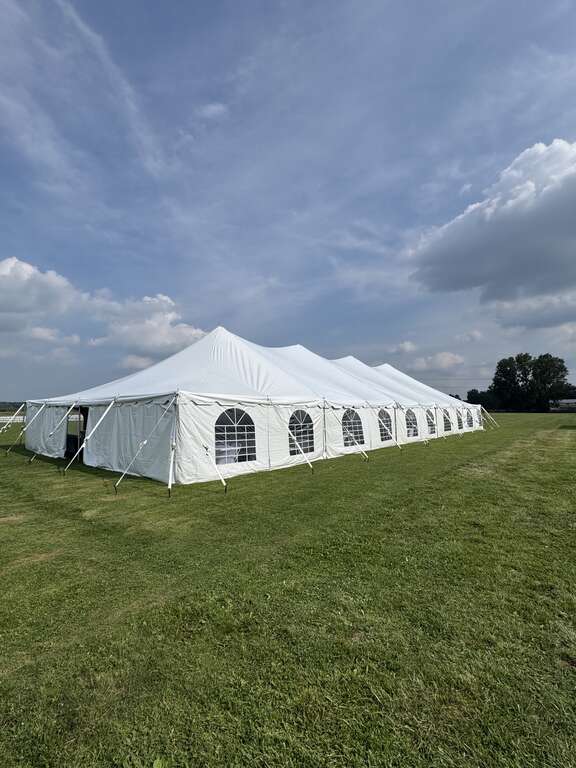 Pole tent with cathedral window sidewalls
