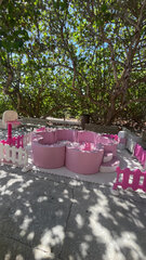 pink and white flower ball pit 