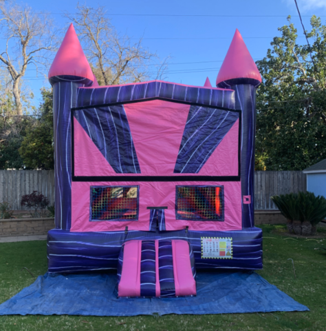 PURPLE AND PINK BOUNCE HOUSE