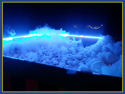 LED lighting visual of a foam pit with foam standing in the pit.