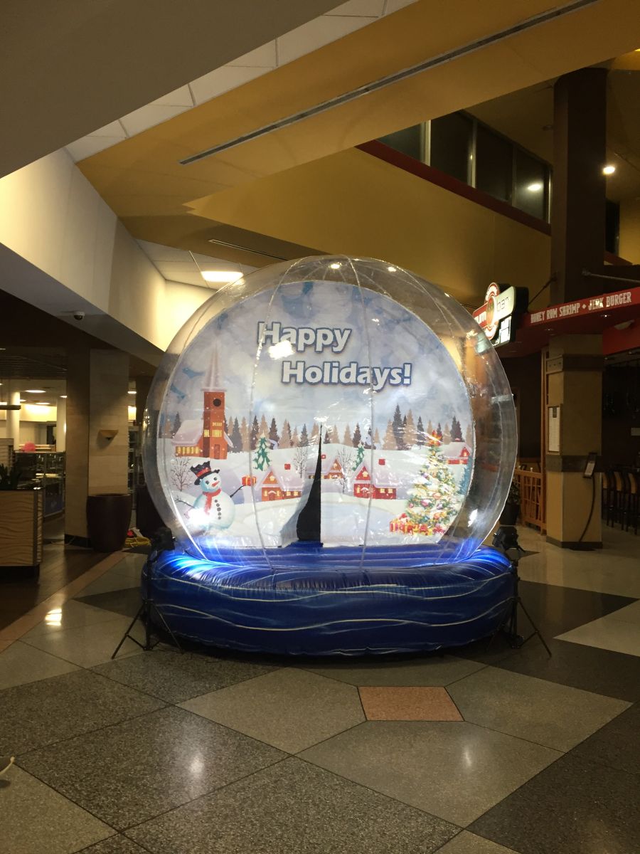 Giant Lifesize human Snow Globe inflatable rental from A Bounceable