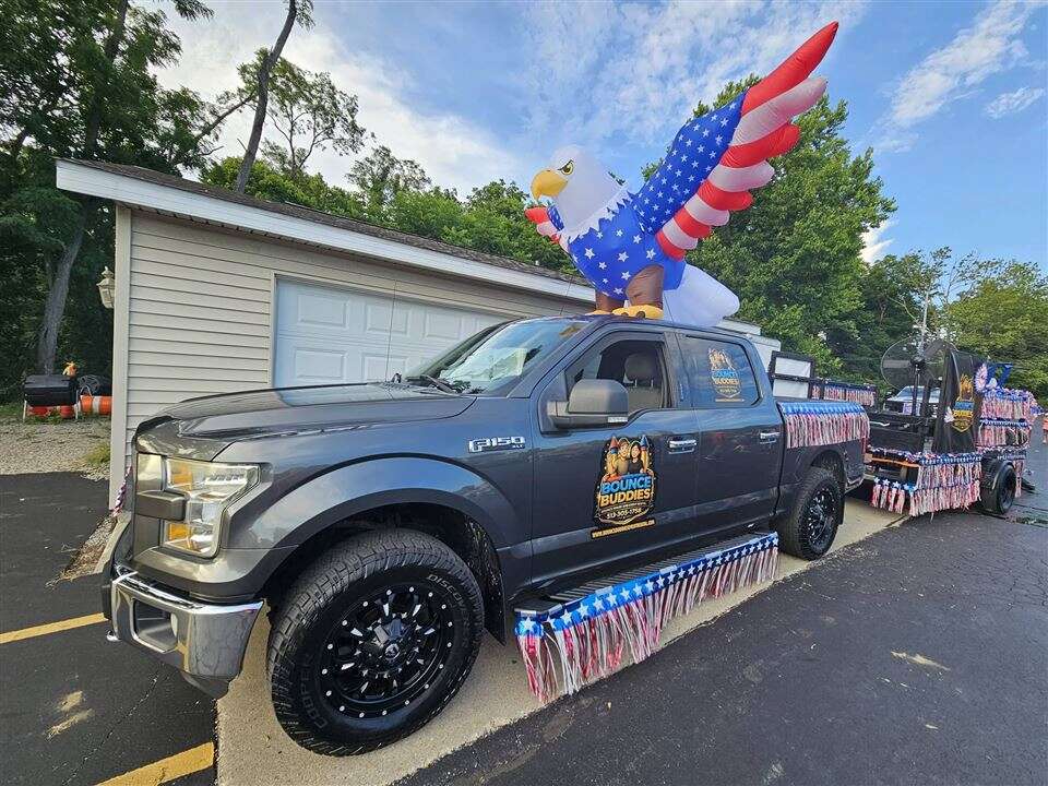 Bounce Buddies truck with a giant inflatable eagle ready for the Madeira parade