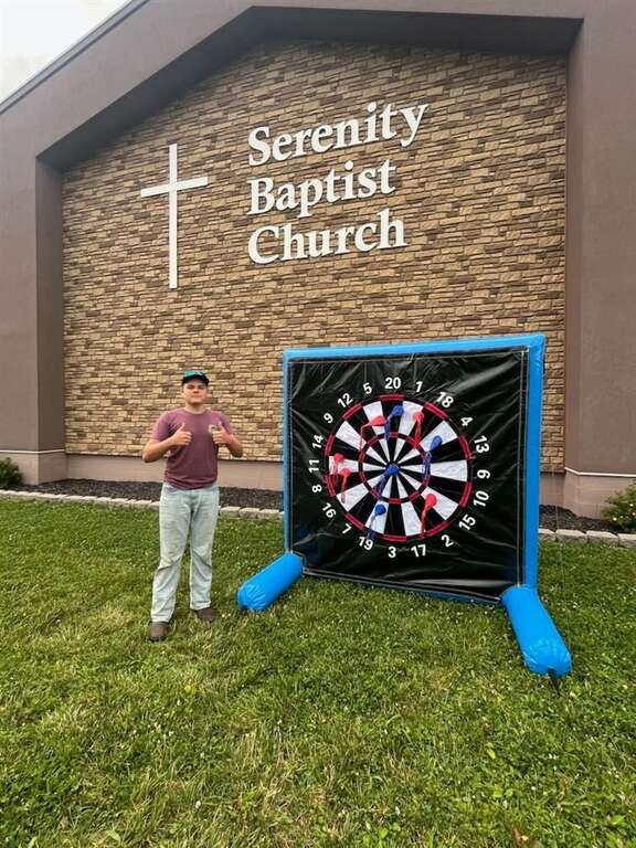 Inflatable dart board game set up in front of Serenity Baptist Church in West Chester, Ohio