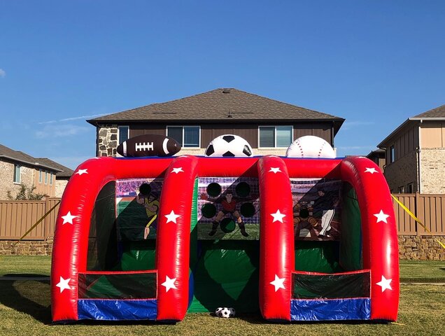 3-in-1 inflatable football, soccer, and baseball game on grass at school event