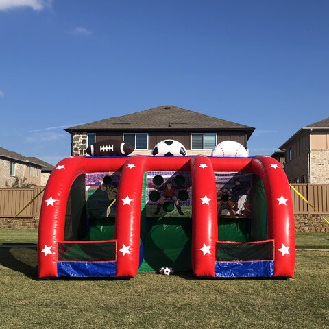 3 in 1 inflatable football, soccer, and baseball game on grass at school for event near Frisco TX.