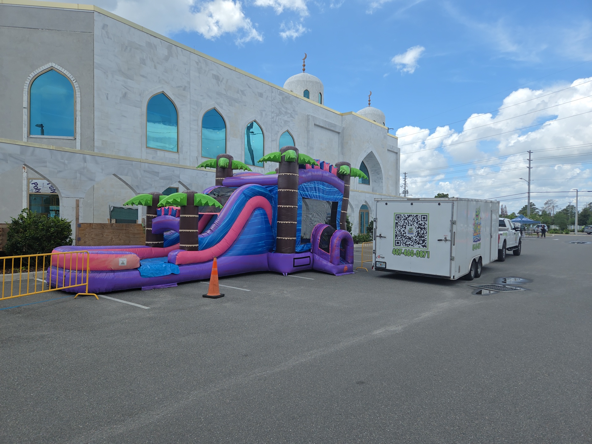 Water slide combo set up outside a church building for a family event