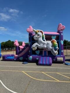 A Unicorn Inflatable Bounce and Slide Combo