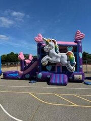 A Unicorn Inflatable Bounce and Slide Combo