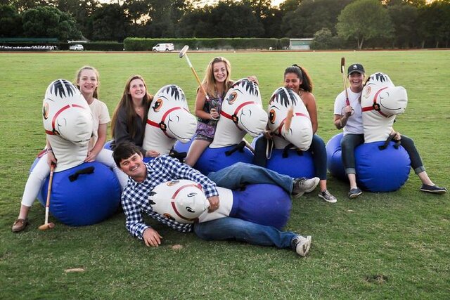 Inflatable pony hops at a corporate event