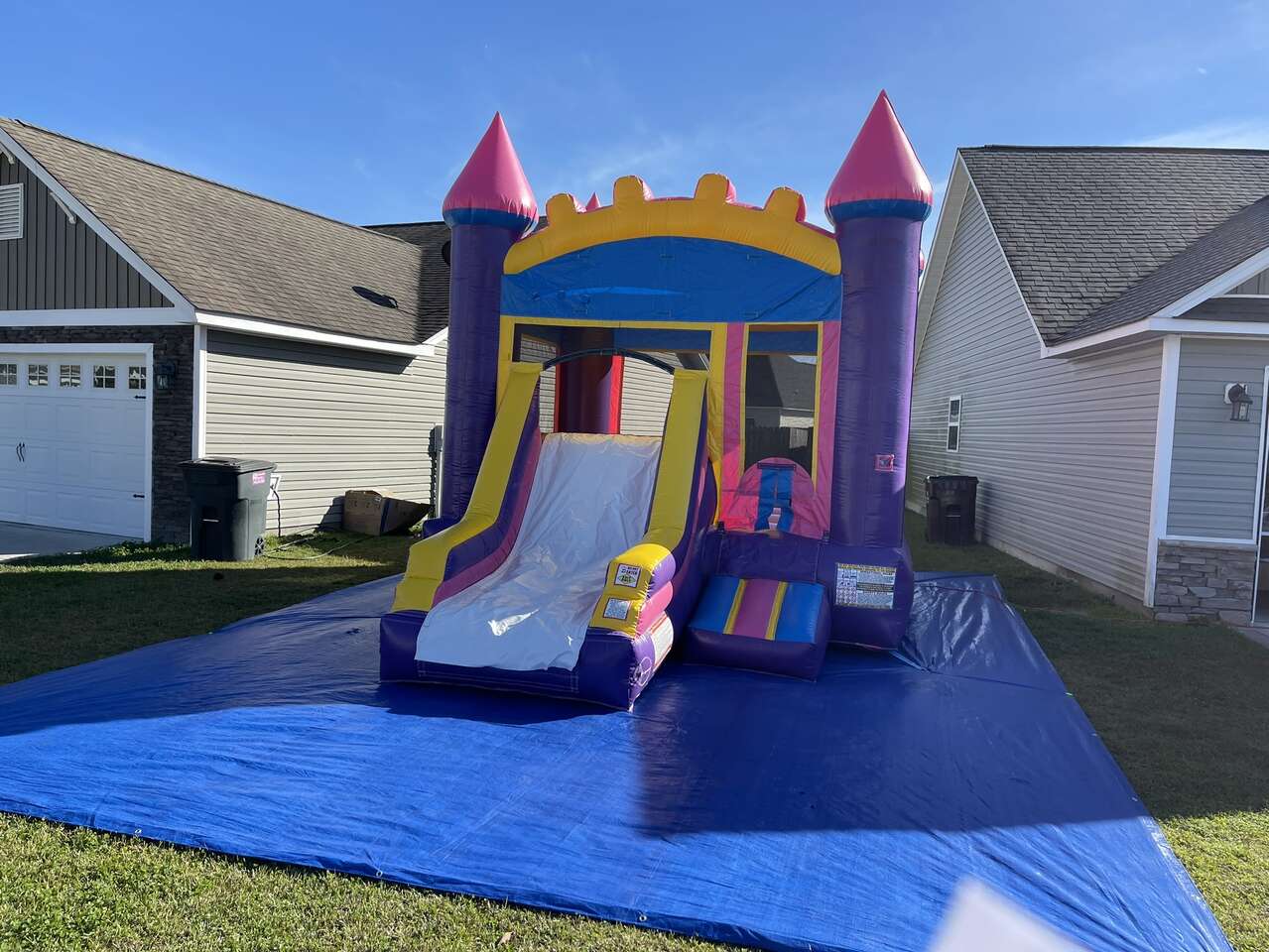purple princess bounce house castle with slide