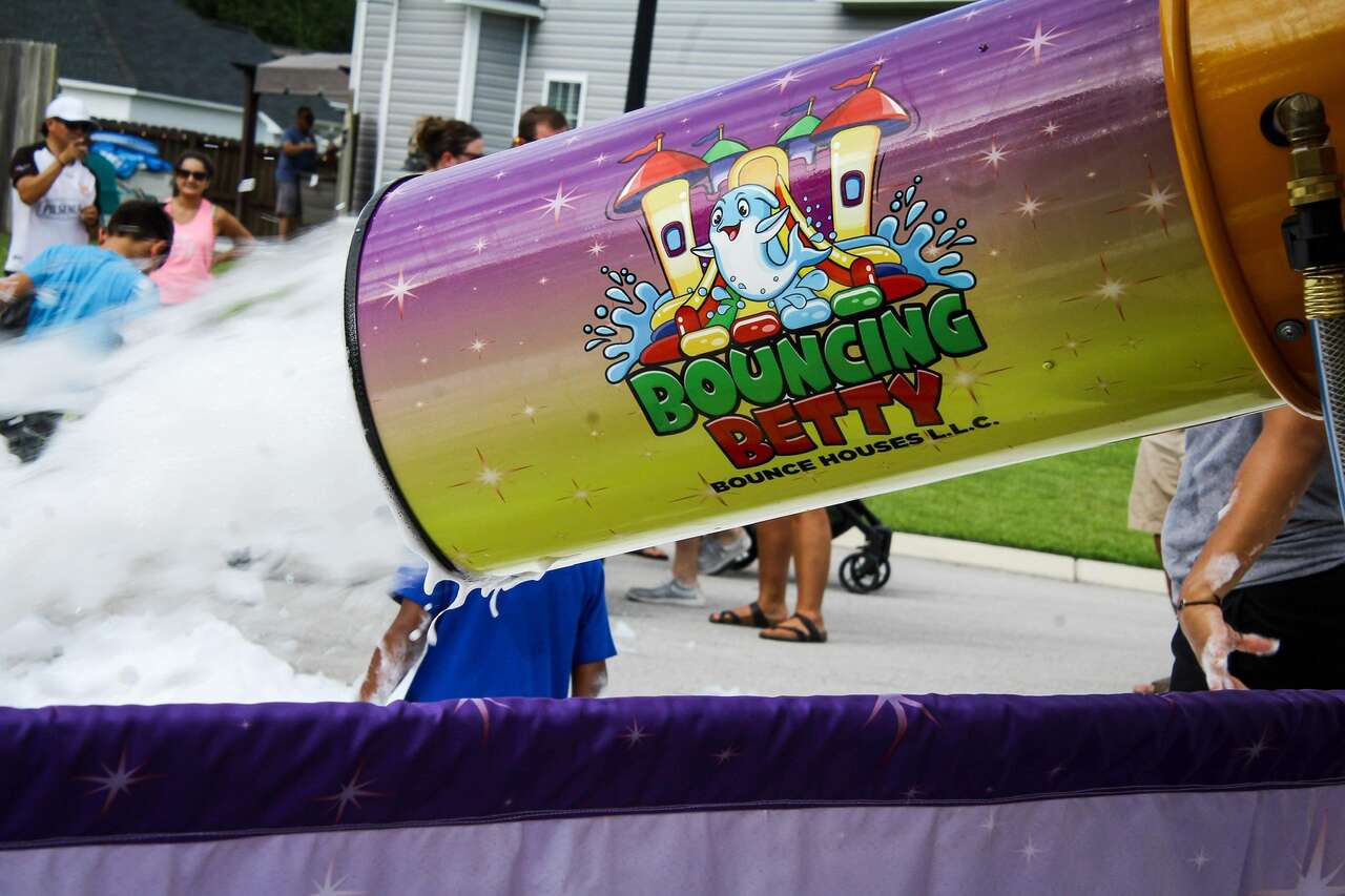 Bouncing Betty Bounce Houses foam cannon shooting foam