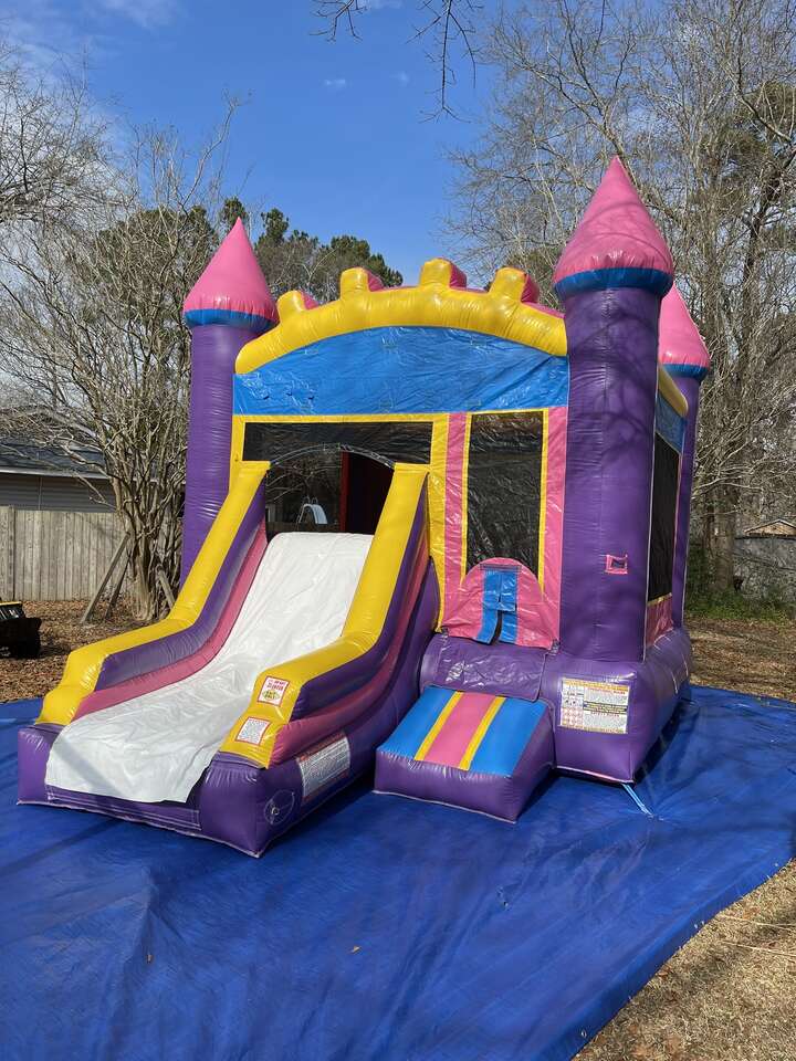 purple and pink princess bounce house castle