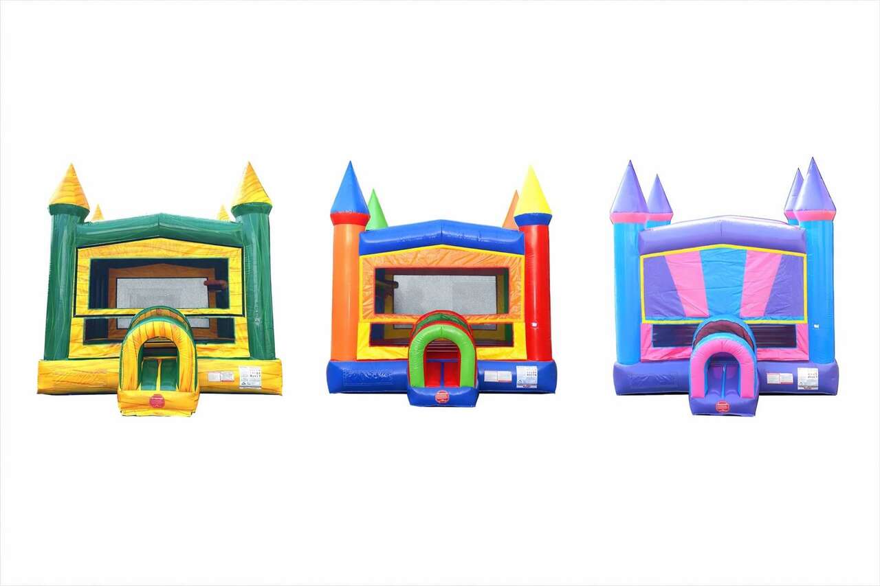 Trio of Bounce Houses. The Green Machine 13x13 Bounce House. The Colorful Kingdom, a rainbow bounce house. Pretty in Pink Bounce House 13x13