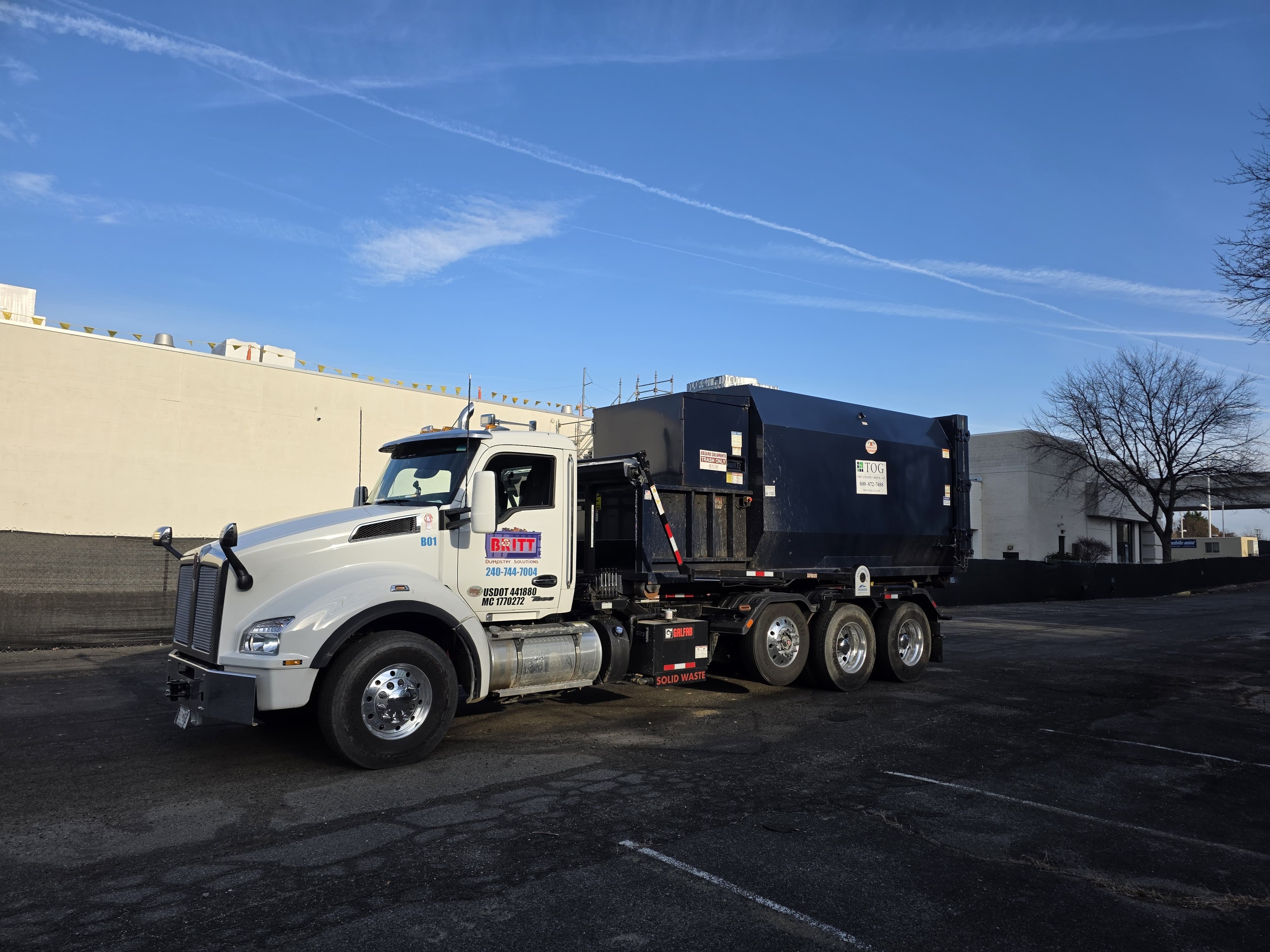 Compactor hauling 