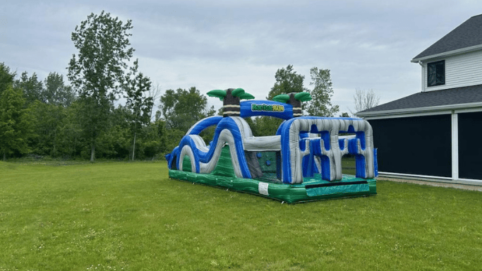 40 foot long yellow obstacle course set up on the front yard of a town of Tonawanda home