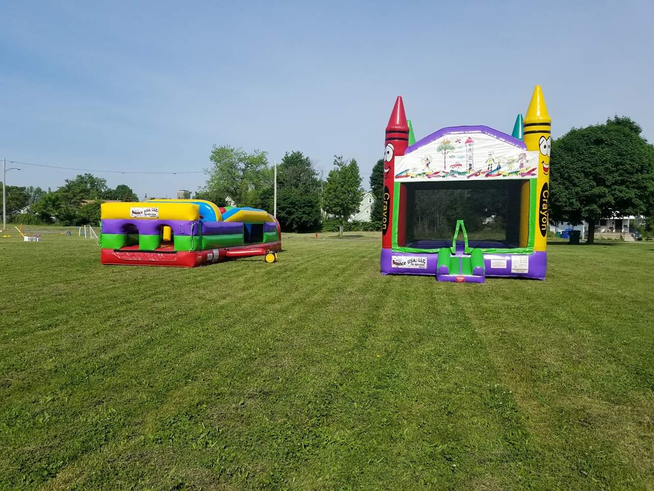 Obstacle course and bounce house ready to be used for a school event